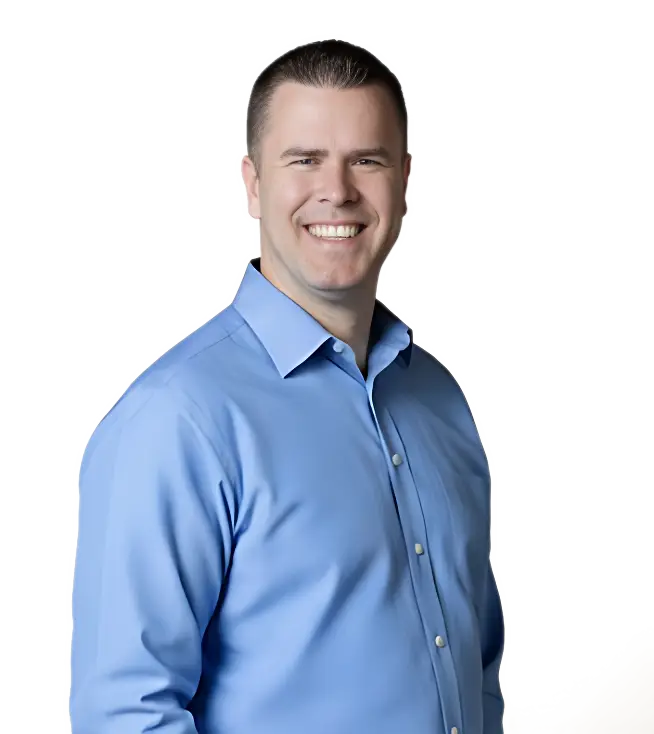 Image of Nate Roberts in blue dress shirt smiling.